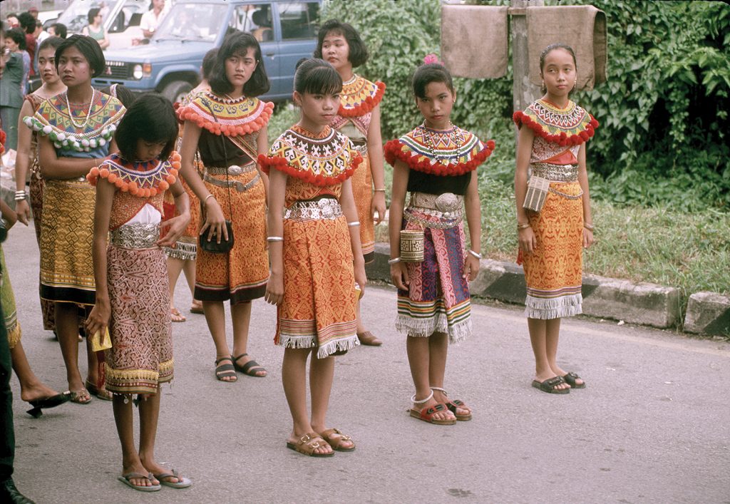 Ban girls who are in indigenous costumes who are part of the Orang Asli