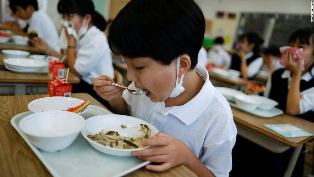boy eating school meal